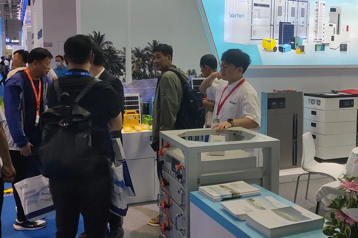 Visitors engage in technical discussions and exchange insights at the GODE booth