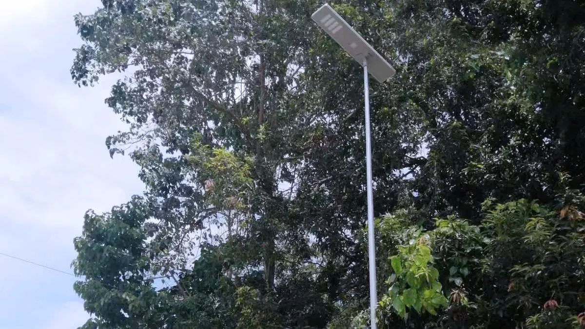 0911 Series 200W solar street light installed on a rural road in Nigeria providing off-grid outdoor illumination