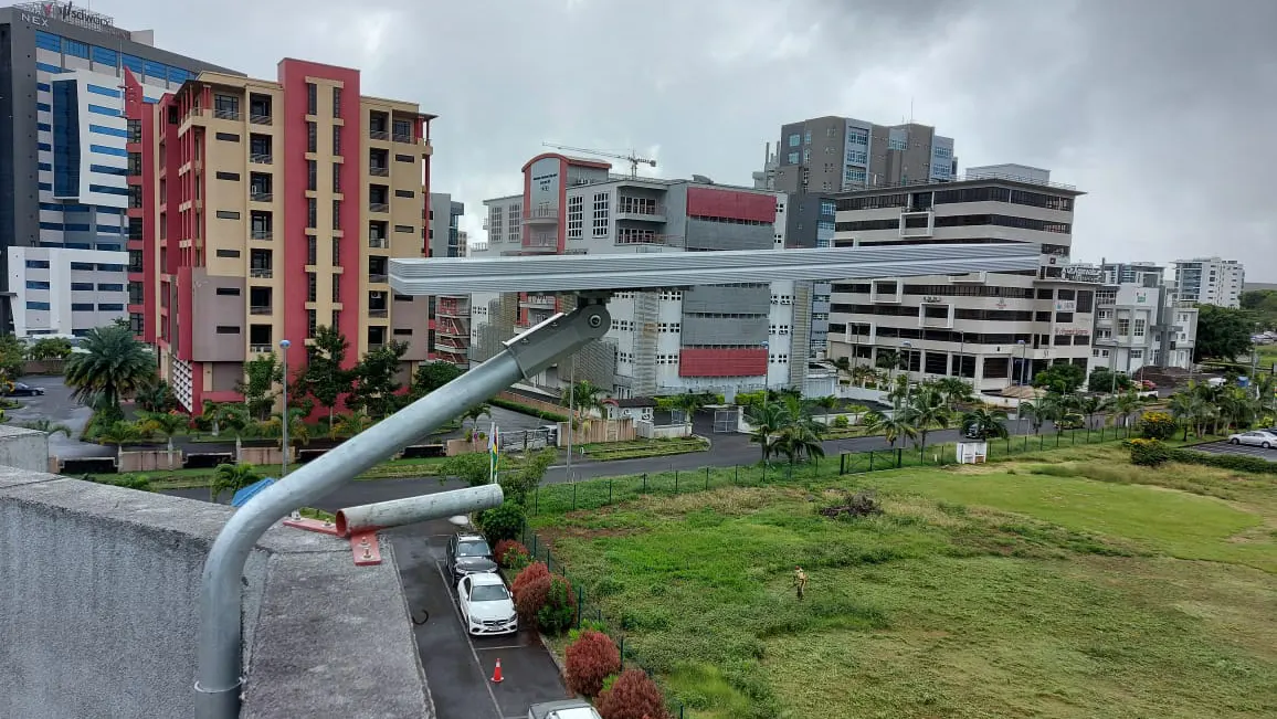 0911 Series 50W solar street light installed on a rooftop balcony in Vietnam for residential outdoor lighting